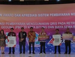 BSG Serahkan QRIS Retribusi Rusunuwa dan PBG pada North Sulawesi Investment Forum 2024